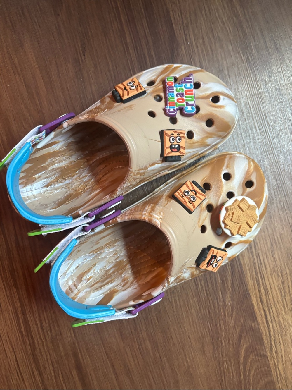 CROCS Tan Swirl Clogs with Multicolor Heel Straps and Charms